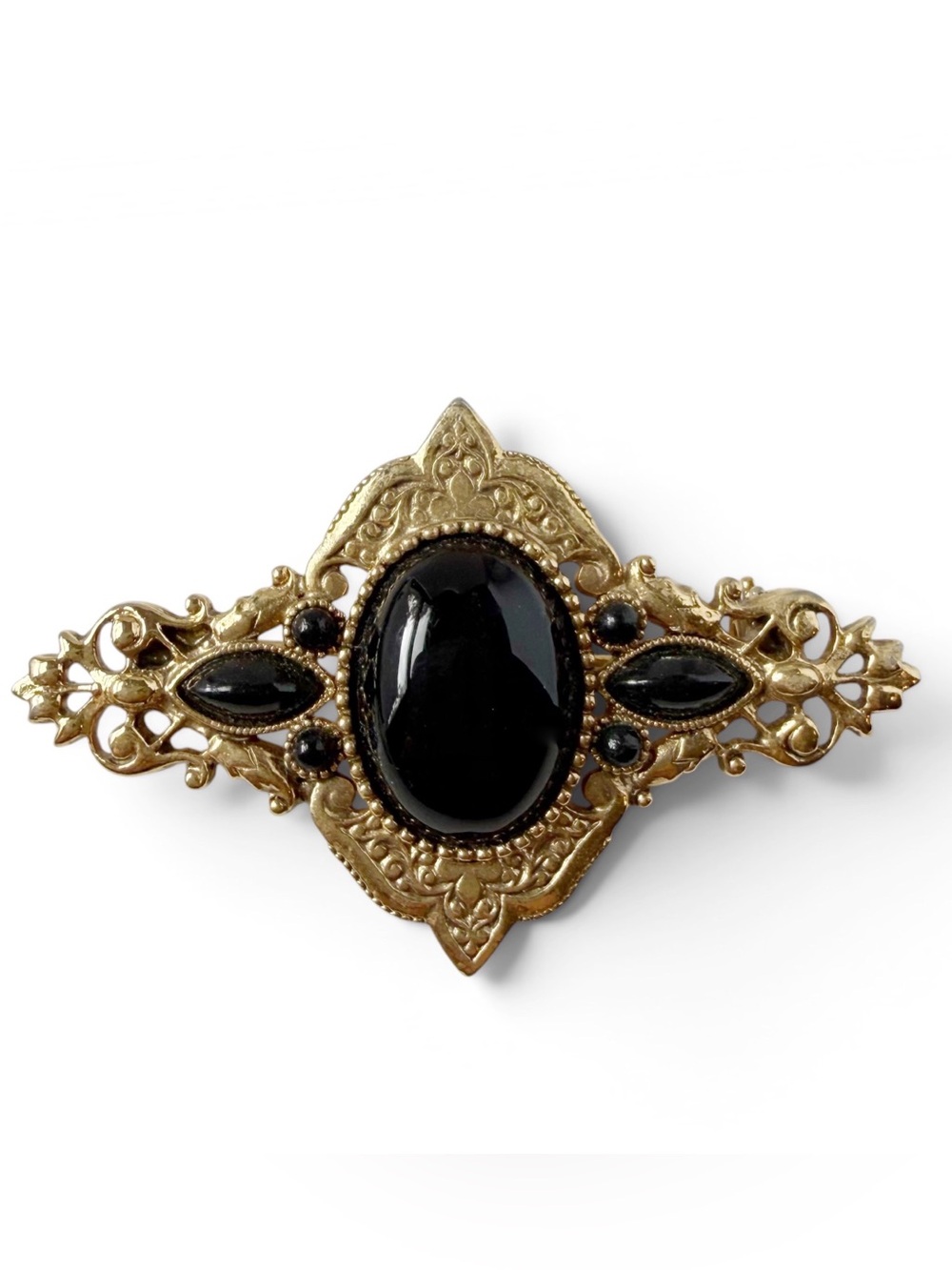 Vintage 1928 Victorian Revival Black Lucite Ornate Goldtone Brooch Pin
.